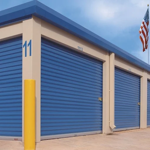 Blue commercial rolling steel storage unit doors